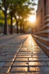 Obraz premium A brick walkway with a sun shining on it.