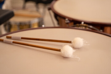 detail of the drumstick placed on the drum