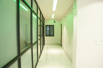 Empty corridor area in the modern office building. glass wall, concept of hallway, lobby.