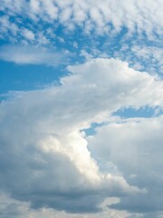 Beautiful sky with fluffy white clouds