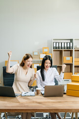 Starting small businesses SME owners, two check online orders Selling products working with boxs freelance work