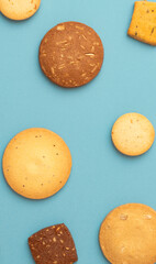 cookies on the light blue background. 水色背景の上に置かれたクッキー	
