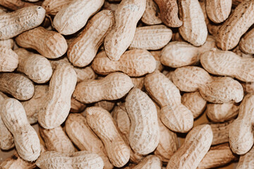 Peanut in a shell,food background,top view,full of healthy tasty peanuts, Peanuts texture background, peanuts in a shell.the view from the top.
