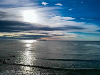 Serene seascape with reflections from the setting sun