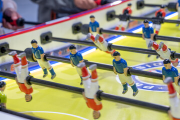 Closeup shot of a man playing table football