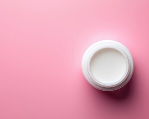 Flatlay of a cream jar on a pastel pink background, minimalist aesthetic, soft shadows, top view