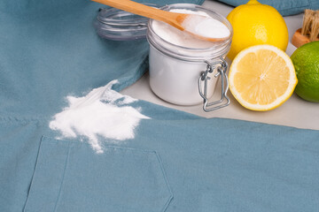 Natural cleaning method to remove sweat stains under the armpits. Eco-friendly remove stains from clothes using baking soda. Embracing a zero-waste lifestyle. top view.