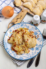 Homemade dumplings with cabbage.