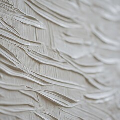 White paint texture creating abstract pattern on canvas close up