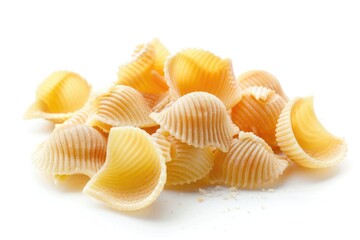 Freshly cooked pasta shells arranged on a clean white surface