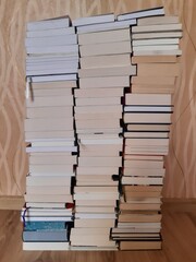 A stack of books, 100 books, hundred books, thousands of pages