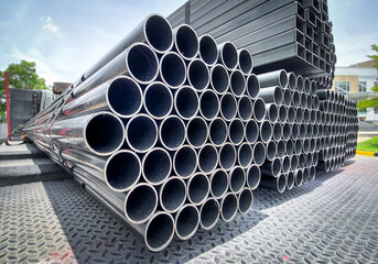 Construction products on transport vehicles Group of steel pipes for industrial materials...