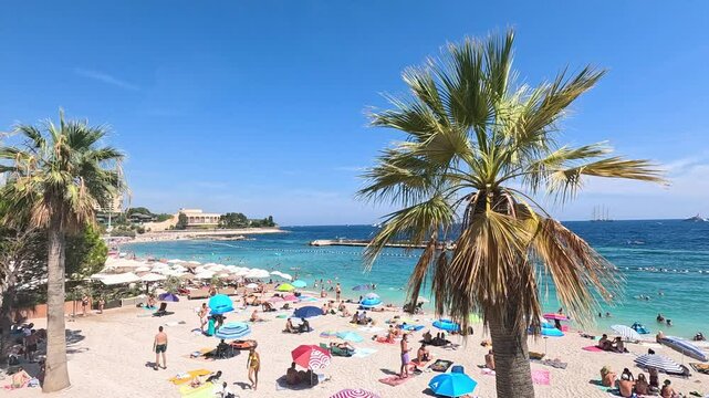 Sunbathing Tourists on Monte Carlo Beach