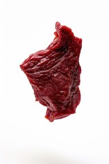 Obraz premium A piece of meat suspended in mid-air