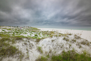 stock panama city beach sand dune sea oats emerald waters storm clouds