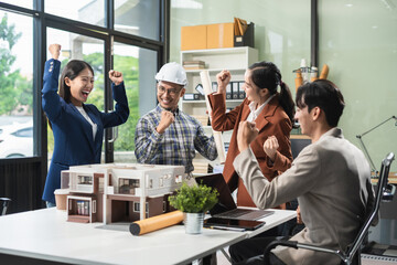 Engineer Teamwork Meeting, Drawing working on blueprint meeting for project working with partner on model building at company office. Asian industry professional team