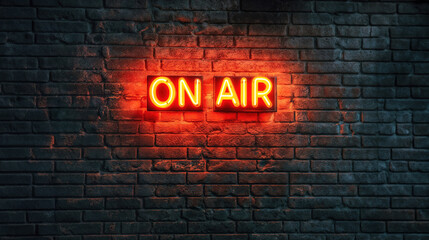 Dark background of a brick wall with a neon sign saying “On Air”.