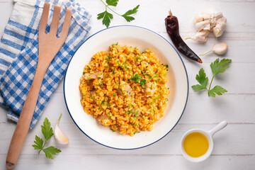 Rice paella with fresh tuna. Top view table.