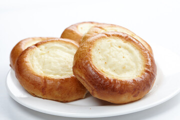 fresh buns on the white plate