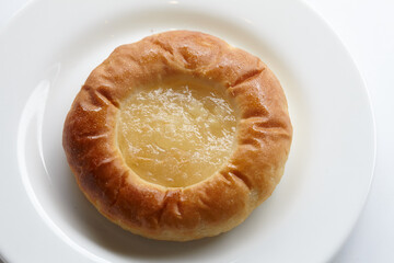 fresh buns on the white plate