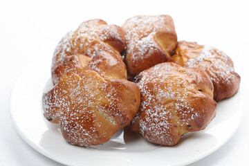 fresh buns on the white plate