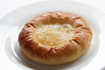 fresh buns on the white plate