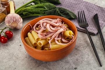 Italian cuisine - pasta tortiglioni with squid
