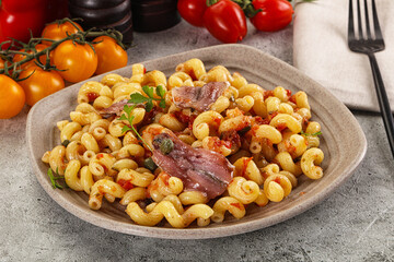 Italian pasta cellentani with anchovy
