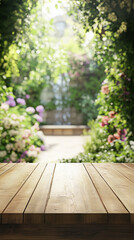 Wooden table overlooks a vibrant sunlit garden with blooming flowers and greenery