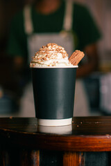 Preparing coffee with chocolate in the café