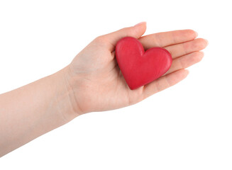 Woman with red decorative heart on white background, top view