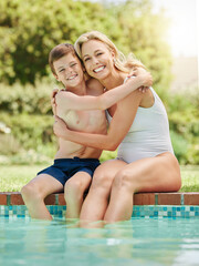 Mother, smile and child by swimming pool with portrait, hug or relax in garden or park. Woman, son...