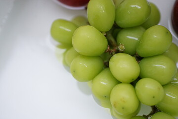 green grapes on a water background