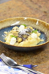 potato gnocchi with poppy seeds and cottage cheese, Czech traditional food, sweet food for children