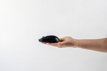 Computer mouse wireless and hand on white background.