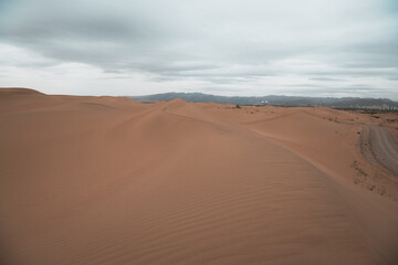 Sunset over the sand dunes in the Gobi Desert in Inner Mongolia, China.