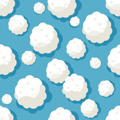 Seamless pattern of white clouds on a bright blue background