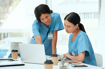 Doctors, women and laptop for research, brainstorming or internet with results, medical website or...