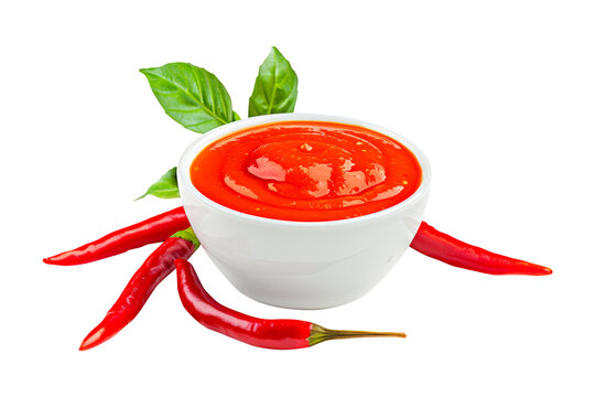 Closeup of smooth Peri-Peri sauce in glass bowl isolated on a white transparent background. Concept of food or culinary ingredient