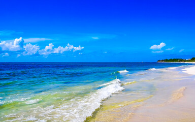 Tropical Caribbean beach clear water waves Playa del Carmen Mexico.