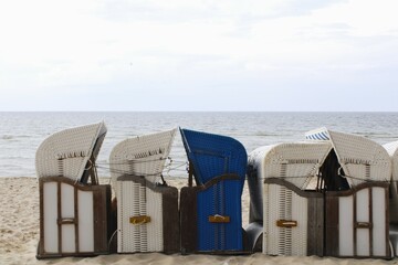 beach chairs around the sea