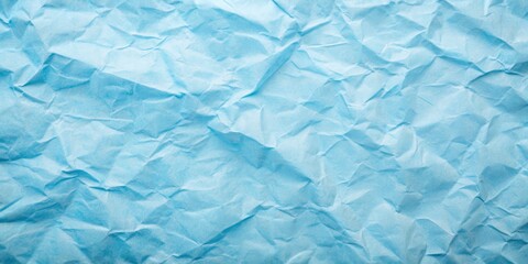 Obraz premium Texture of light blue craft old paper crumpled background with a vintage sky grunge surface backdrop, texture, light blue