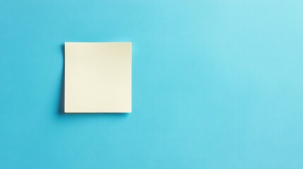 Crisp note paper positioned on a blue panoramic background offering clear space for text or messaging in a serene layout