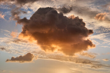 Beautiful vibrant sunset clouds with blue sky