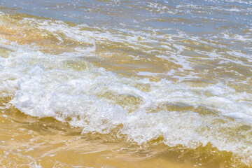 Tropical Caribbean beach clear water waves Playa del Carmen Mexico.