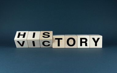 Words Historic Victory spelled out in wooden blocks