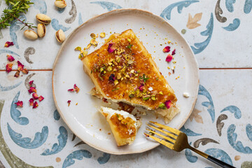 Filo pastry wrapped feta cheese with honey and pistachios