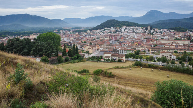 Olot, Spain - 7 Aug, 2024: View from Montsacopa Volcano over the town of Olot, Garrotxa, Catalonia