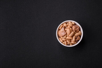 Cassoulet with white beans, meat and sausages, vegetables, salt and spices