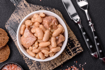 Cassoulet with white beans, meat and sausages, vegetables, salt and spices